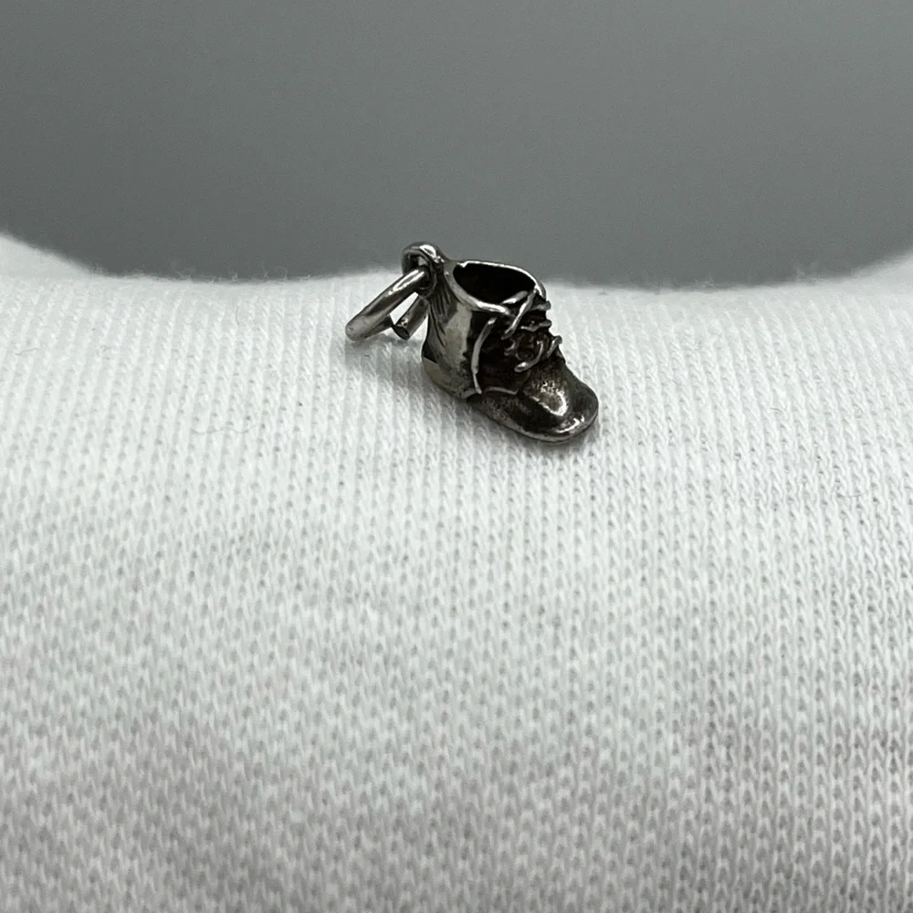 Vintage tiny baby shoe boot Sterling silver charm pendant